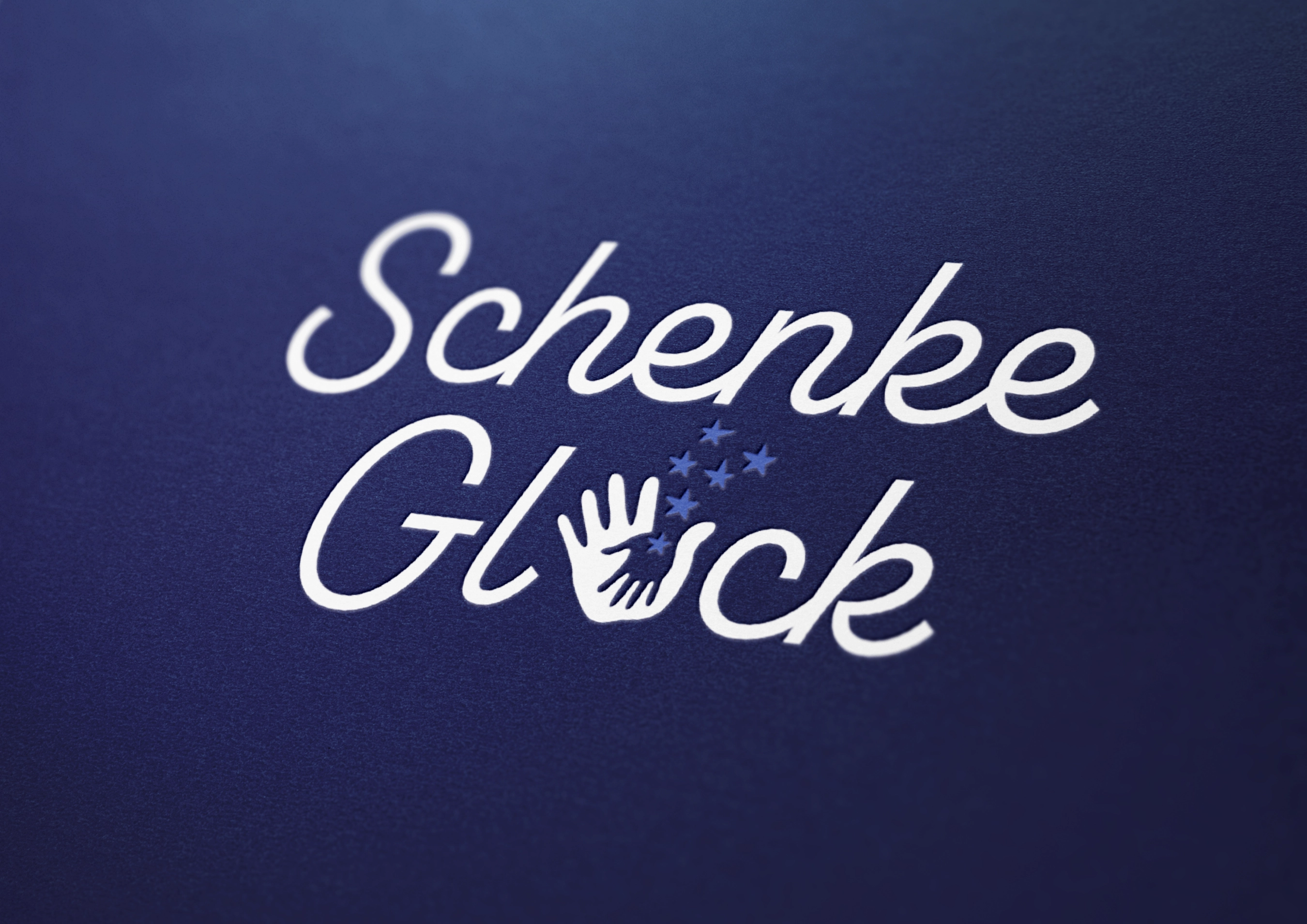 'Schenke Glück' Schriftzug des Image-Flyers.